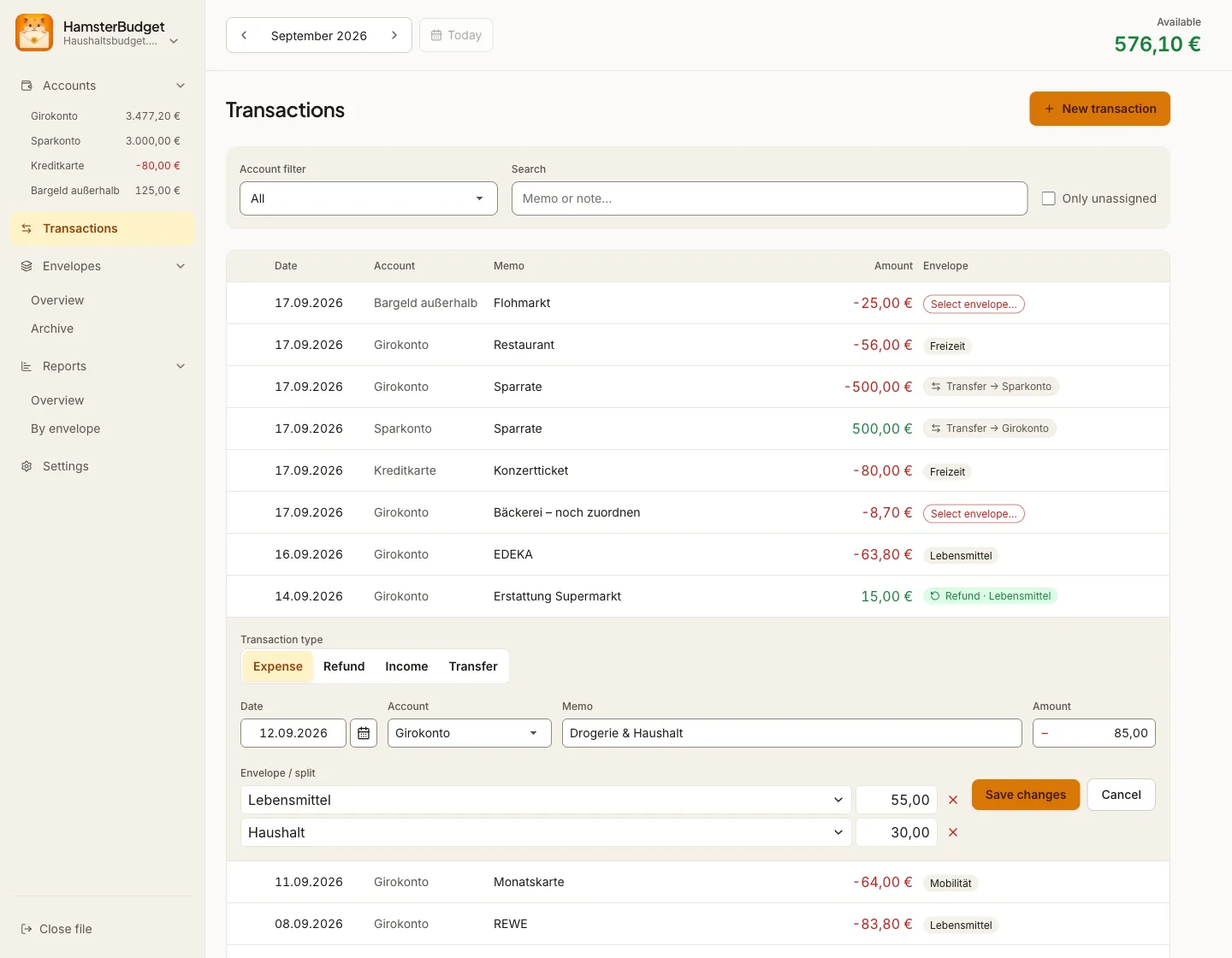Transaction editor showing an 85 euro expense split into 55 euros for groceries and 30 euros for household spending
